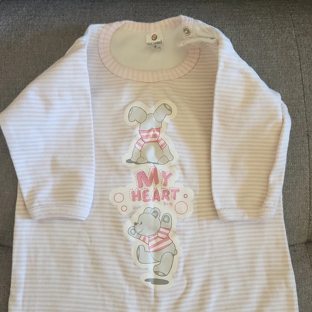 One Piece footed soft pink bodysuit